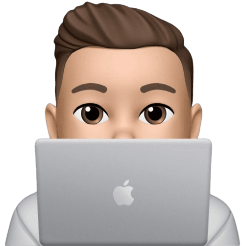 Person peeking from behind laptop